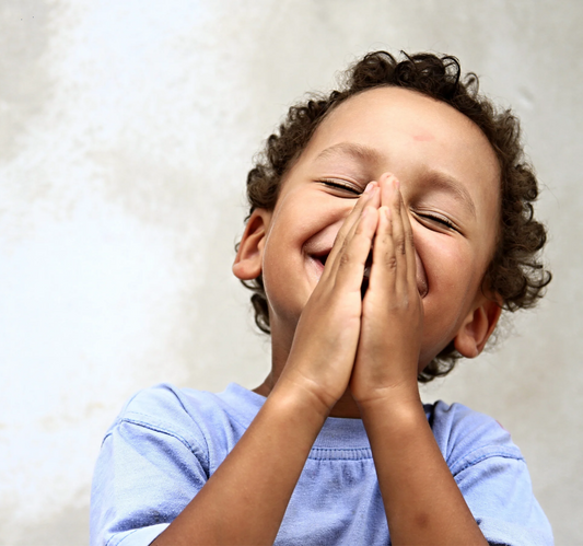 Child praying for a better world