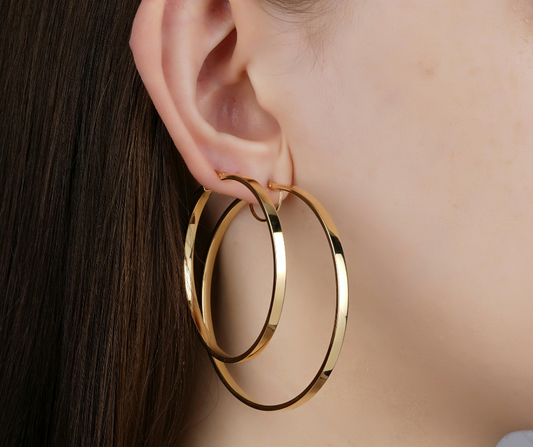 Lady with hopped earrings stacked