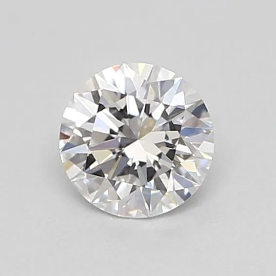 Close-up of a round brilliant-cut diamond showing its facets and clarity on a neutral background