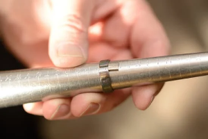 Photo of a jeweller sizing a ring for production 