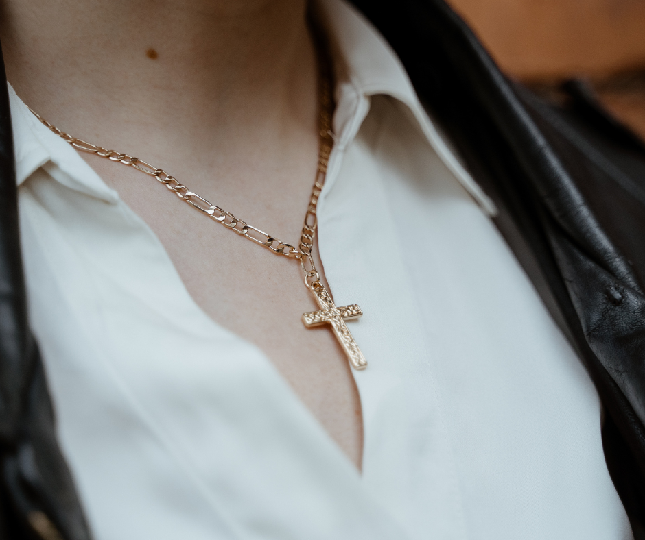 woman wearing a simple gold crucifix