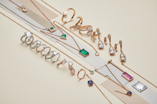 Collage of ethical jewellery pieces made from recycled metals and lab-grown stones displayed on a neutral beige background.