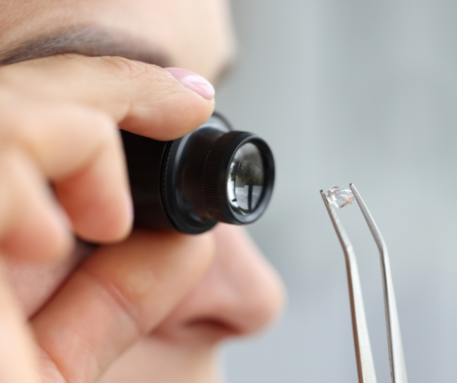 Gemologist valuing a gemstone