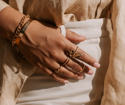 lady with rings stacked on fingers
