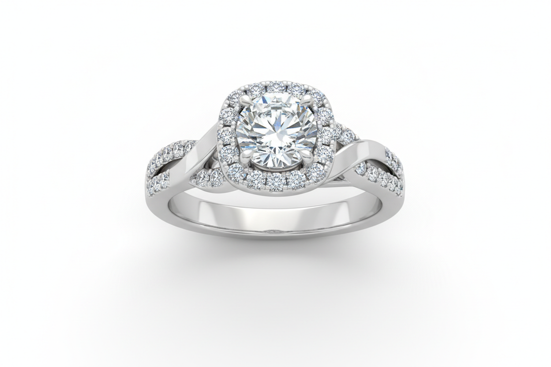 Close-up of a halo diamond engagement ring with a pavé band on a white background under soft lighting