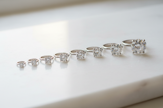 Row of natural diamond rings in 9 ct gold
